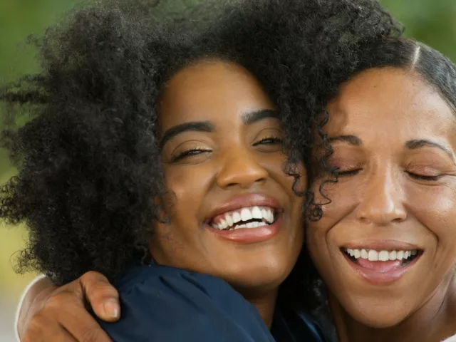 Mother and daughter hugging on Mother's Day