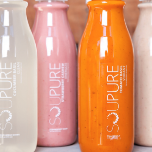 Brightly colored Soupure bottles for a soup cleanse