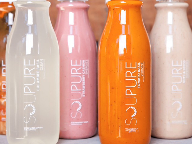 Brightly colored Soupure bottles for a soup cleanse