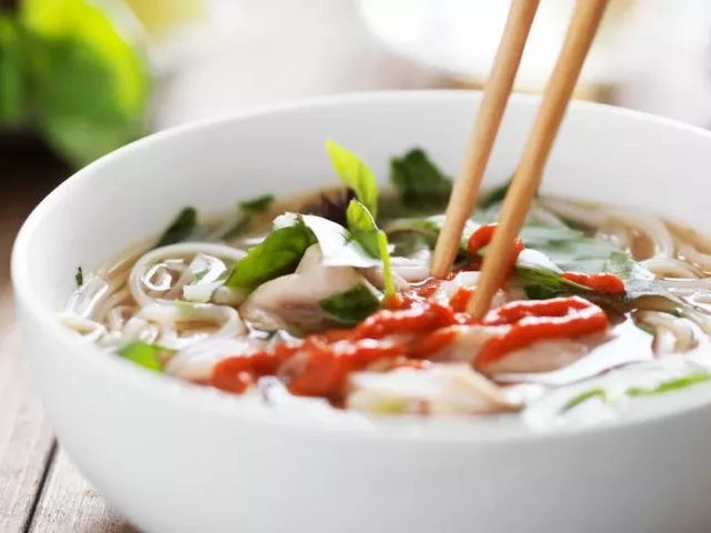 Delicious bowl of soup with chopsticks using a bone broth recipe