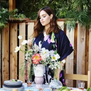 Jessica Murnane standing by outdoor dining area