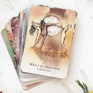 Moon Deck wellness cards in a calming crystal and floral setting