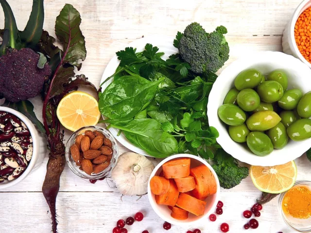 Best foods for liver detox diet, including greens, almonds, olives, and sweet potatoes