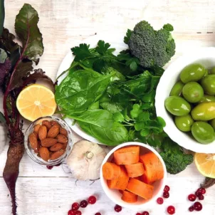 Best foods for liver detox diet, including greens, almonds, olives, and sweet potatoes