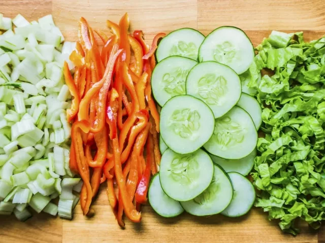 Fresh-cut veggies lined up for meal prep