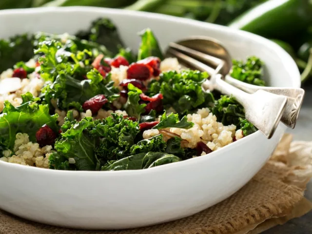 Anti-Inflammatory meal of kale and quinoa salad on nice tablescape