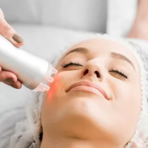 Woman getting Laser and light Therapy Facial at Skin Laundry