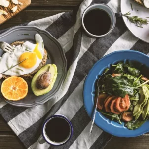 Breakfast with coffee and healthy plant variety