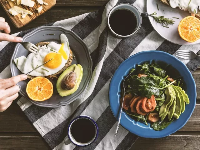 Breakfast with coffee and healthy plant variety