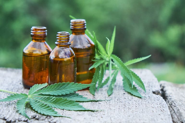 CBD Skincare Tinctures with leaves in nature