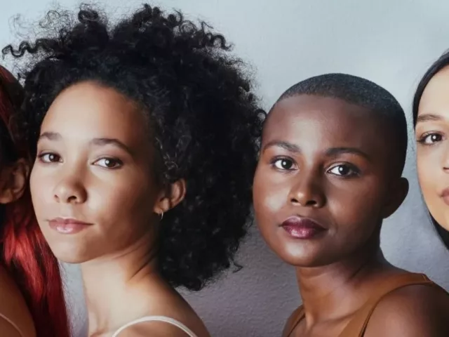 4 diverse women lined up with fresh bare faces