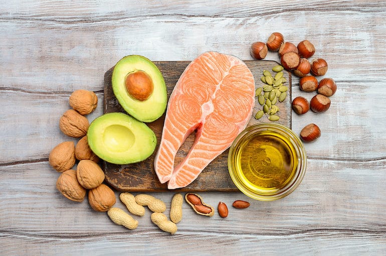 Salmon, avocado, nuts, and other sources of healthy fat to eat on a satiating diet