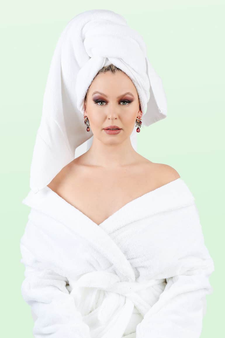 Serena Kerrigan, aka the Queen of Confidence, glammed up in a robe