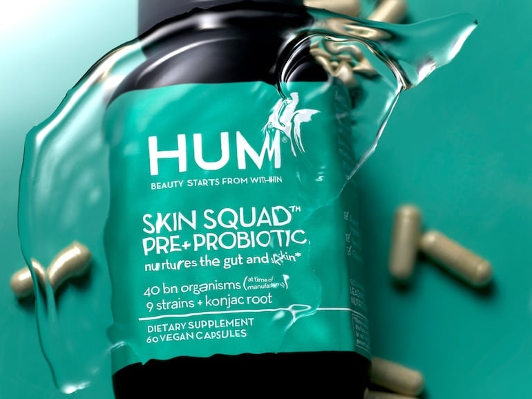 HUM Nutrition probiotic supplement for clear skin Skin Squad in water