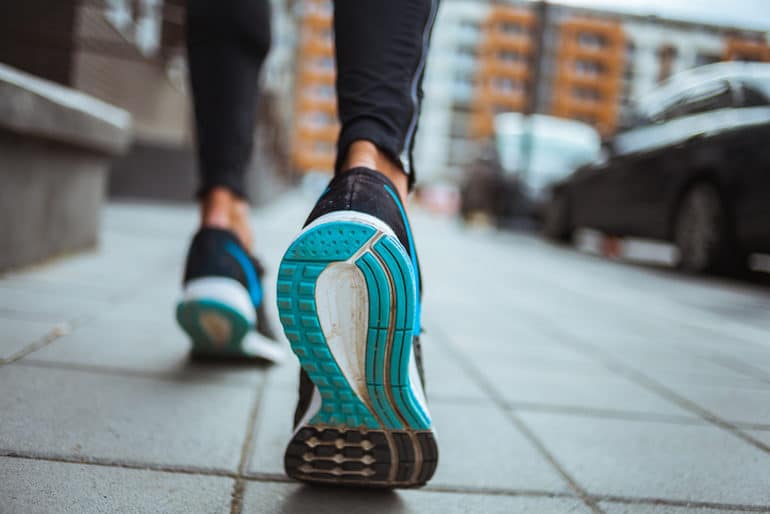 Ground-up shot of blue sneakers