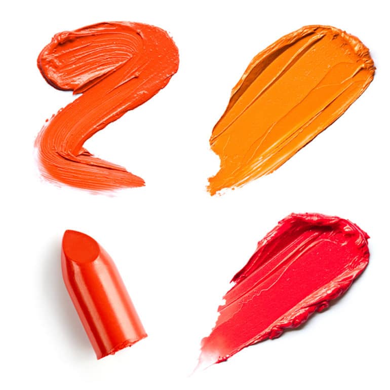 Red and orange lipstick smears for autumn