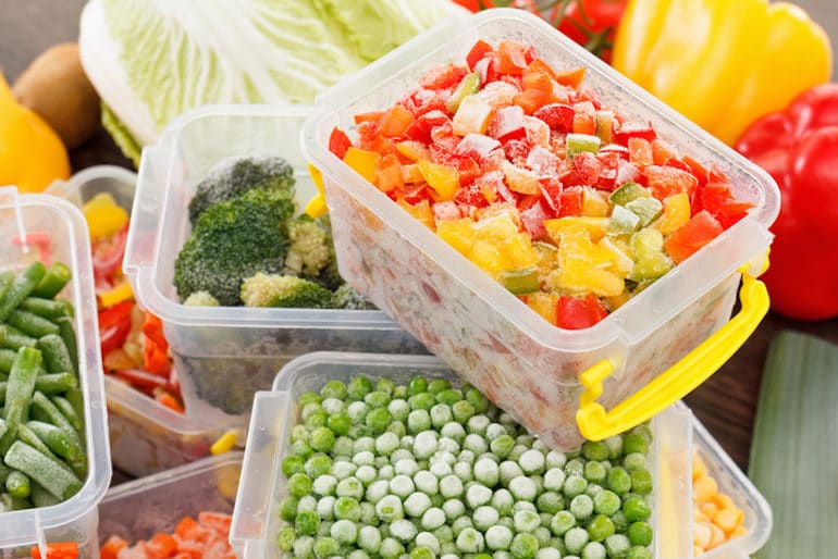 Frozen vegetables in microwave-safe containers