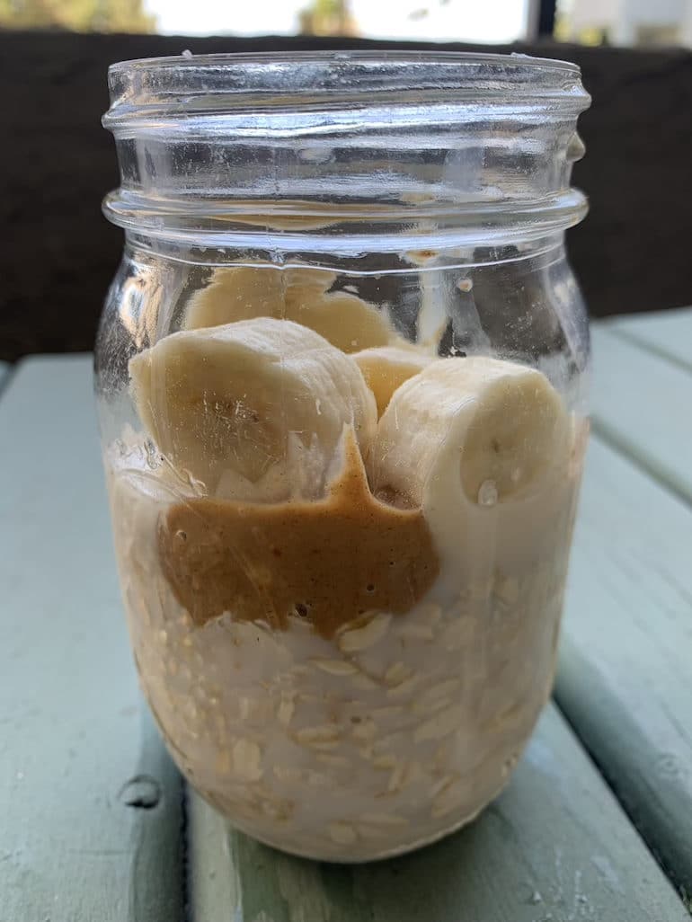 Overnight oats with oatmeal, almond milk, cinnamon, 1 whole banana and a tbsp peanut butter