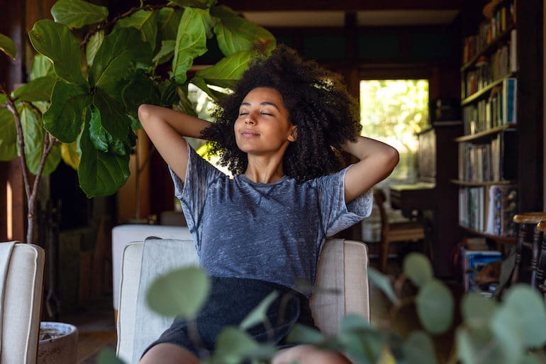 Young woman calm at home resting easy