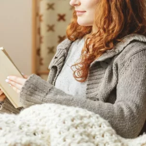 Woman reading fall 2019 health and wellness books