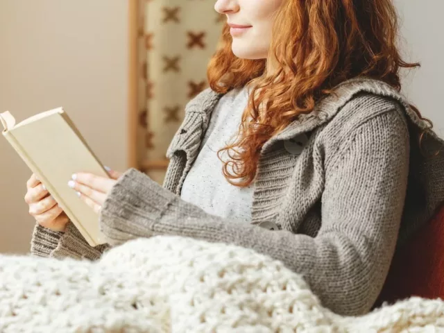 Woman reading fall 2019 health and wellness books