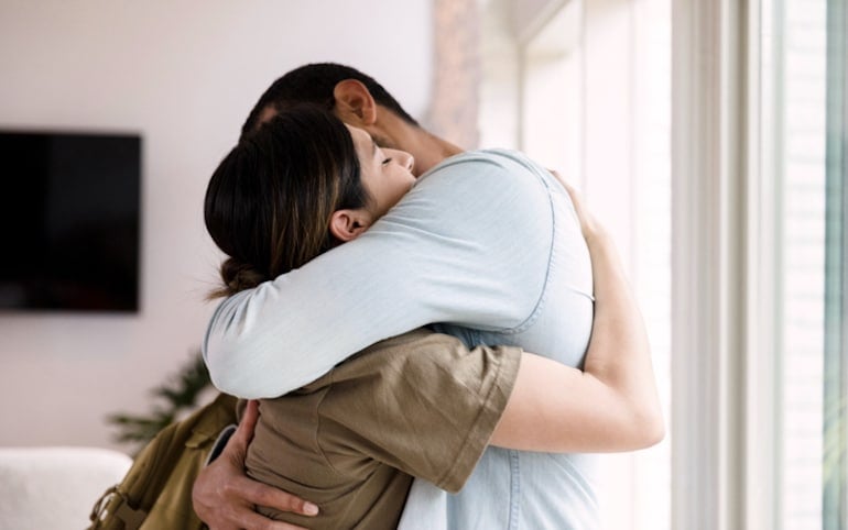 Couple embracing after talking about past wounds and healing