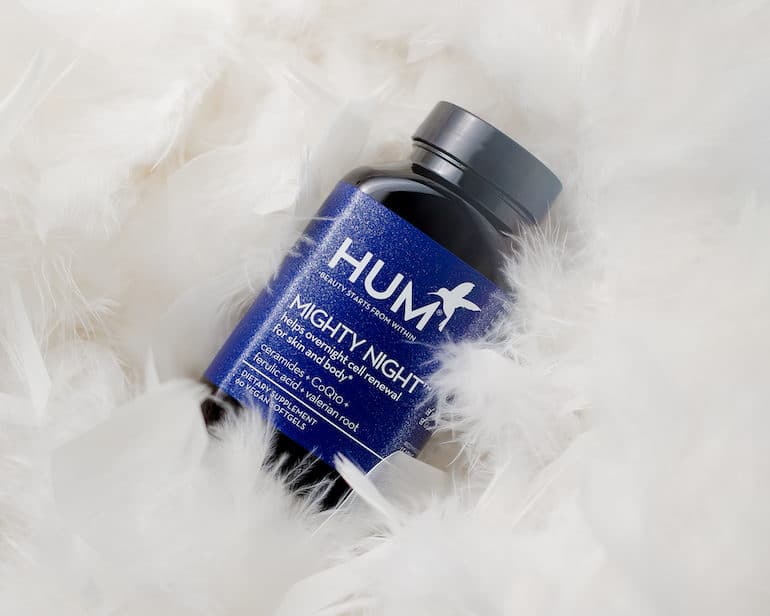 HUM Nutrition Mighty Night bottle in white feathers