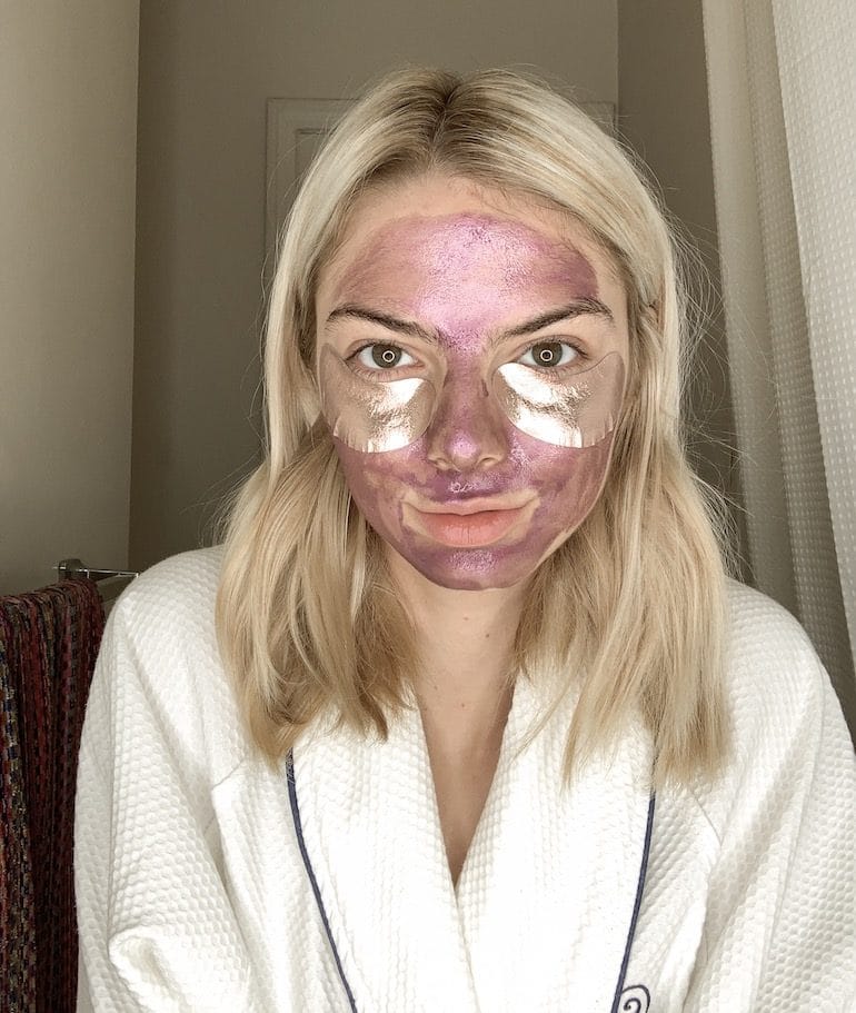 Actress Allie Marie Evans with Wander Beauty Face Mask and Baggage Claim Gold Eye Masks