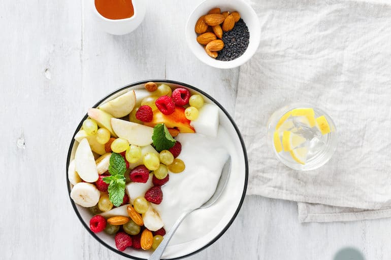 Greek yogurt with fresh fruit and honey for a Mediterranean diet breakfast