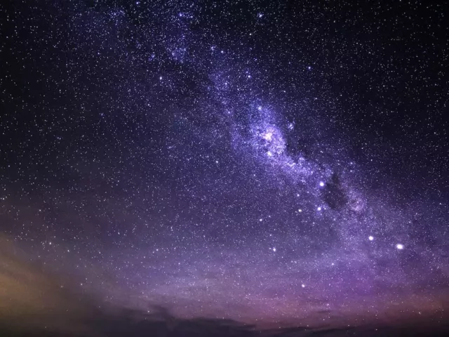 Colorful celestial night sky with Milky Way view