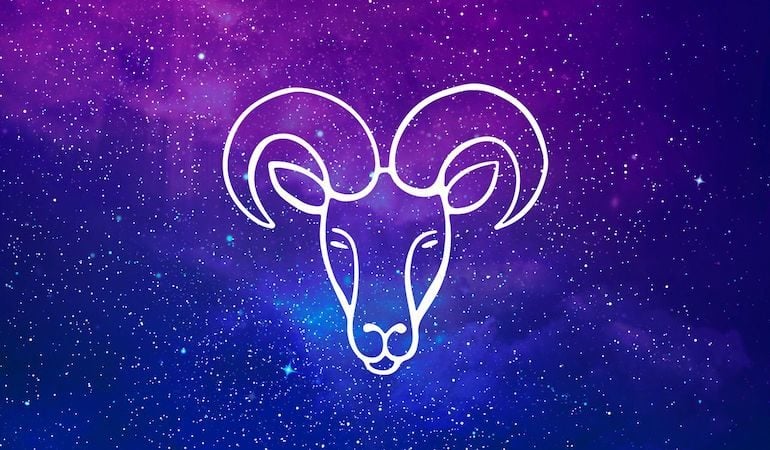 Aries ram symbol on purple and blue starry background