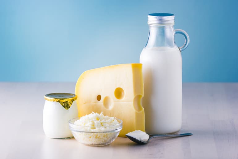 Dairy products, including cheese, milk, and yogurt, are foods to avoid for clear skin