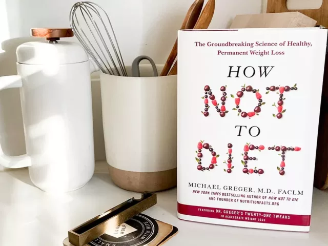 How Not to Diet book by Dr. Michael Greger in kitchen