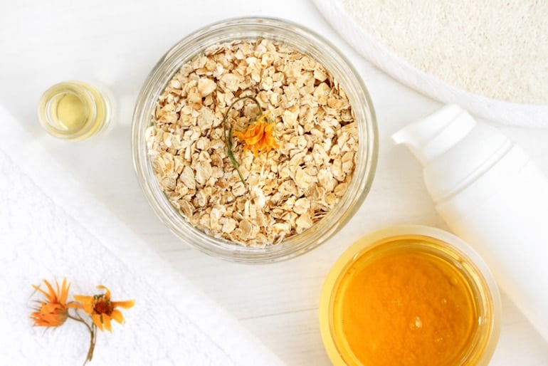 Oats and honey to make a DIY beauty recipe for hands