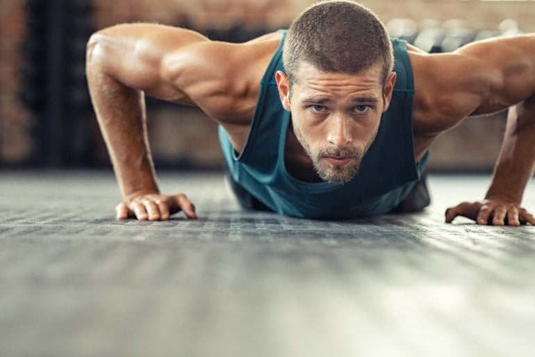 Man following a plant-based diet still building muscle with pushups