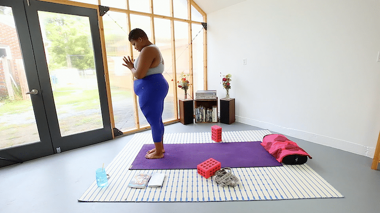 Jessamyn Stanley teaching yoga on The Underbelly