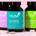 HUM Nutrition probiotics Private Party, Skin Squad, and Gut Instinct on pink background