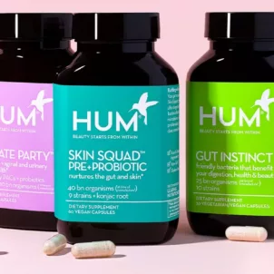 HUM Nutrition probiotics Private Party, Skin Squad, and Gut Instinct on pink background