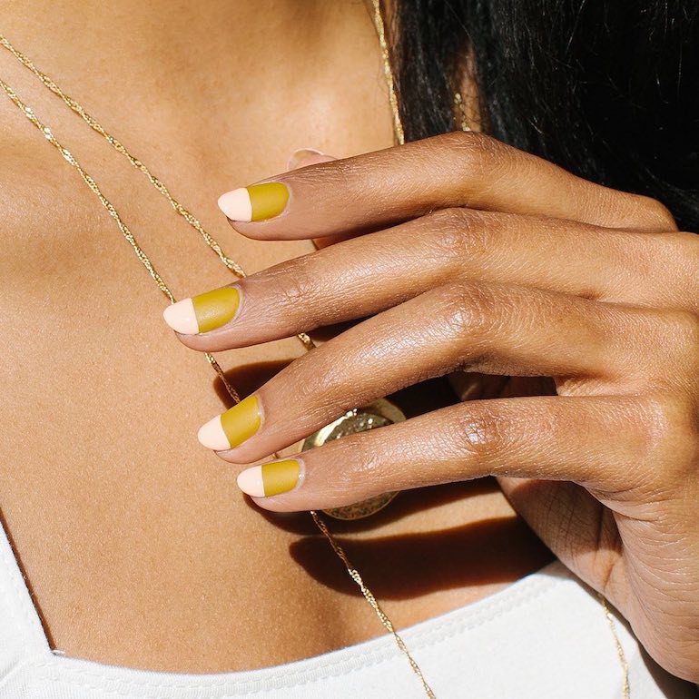 Woman with two-toned gel manicure