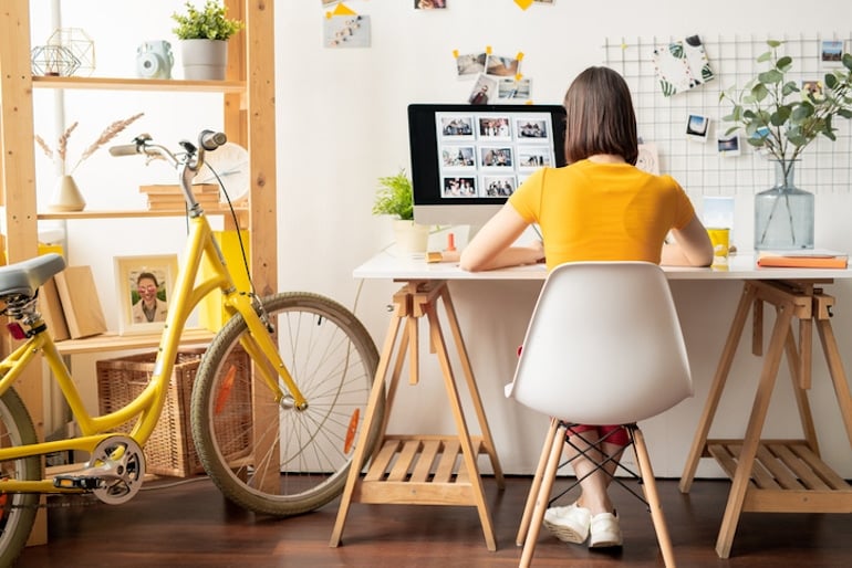 Woman working from home with great ergonomic setup