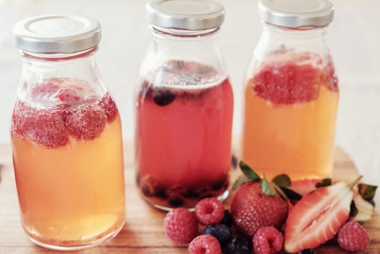 3 glass bottles of fermented probiotic kombucha to boost your gut health and immune system