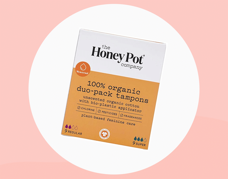 The Honey Pot Co organic tampons - a pack on a pink background