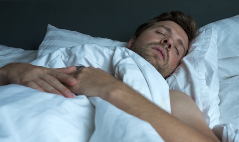 Man dreaming during REM sleep and having greater dream recall