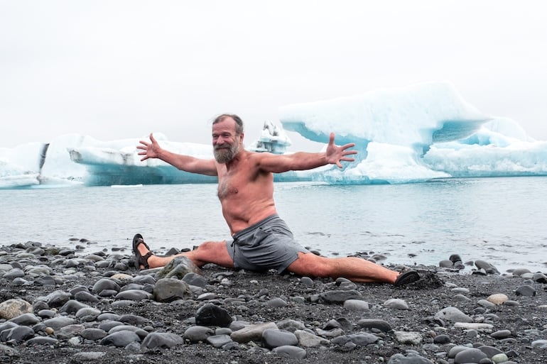 Wim Hof doing a split in Iceland to illustrate the proven scientific benefits of the Wim Hof Method and cold therapy