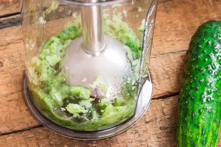 Blended cucumber for a DIY hydrating face mask with egg whites, honey, and yogurt