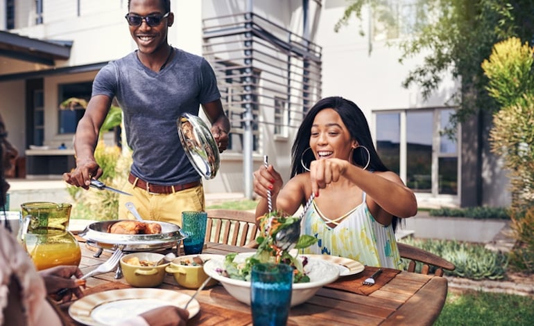 Group lunch outdoors with tips for mindful eating, such as no phones at the table and portioning out food