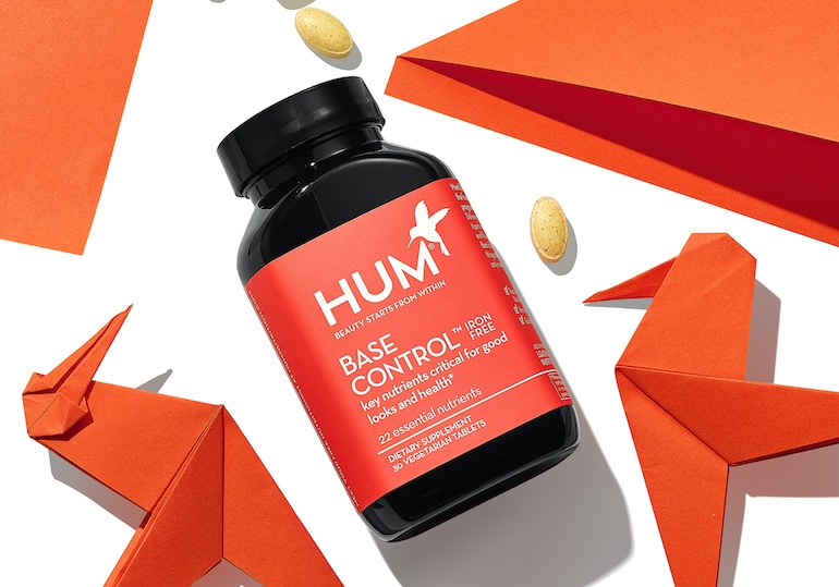 HUM Base Control multivitamin with red bird origami and vitamins for immunity