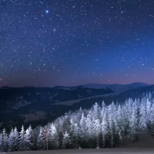 Starry sky around December holidays for astrology and horoscope concept