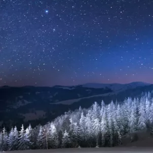 Starry sky around December holidays for astrology and horoscope concept