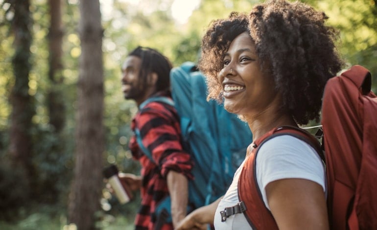 Couple hiking and enjoying nature and each other's company by staying present